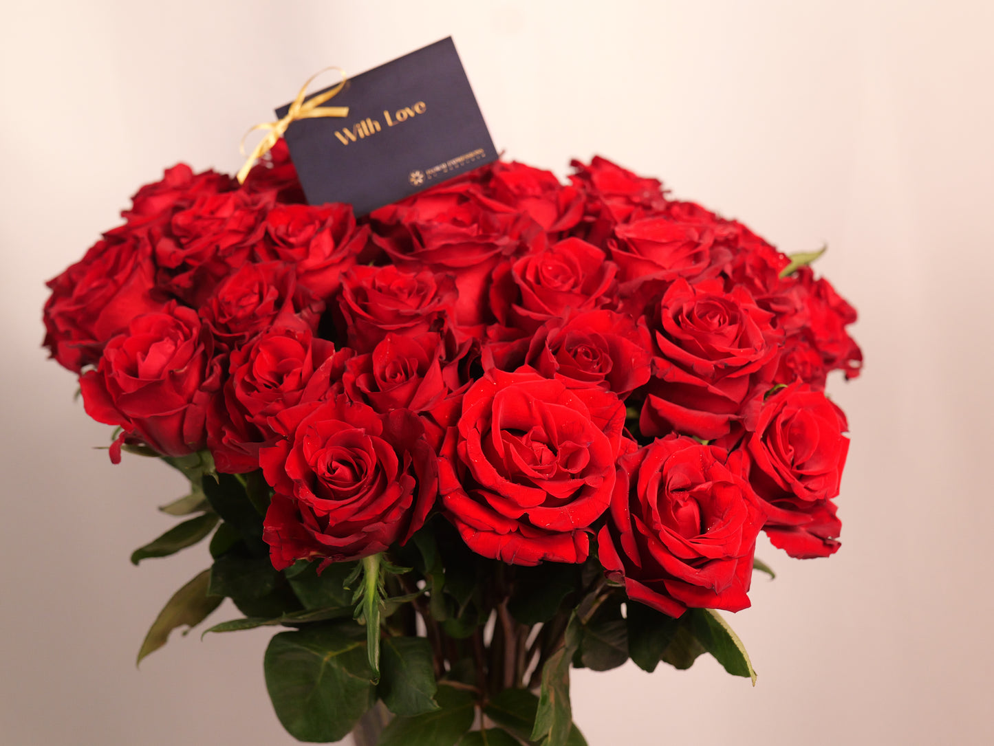50 Red Roses in Large Glass Vase