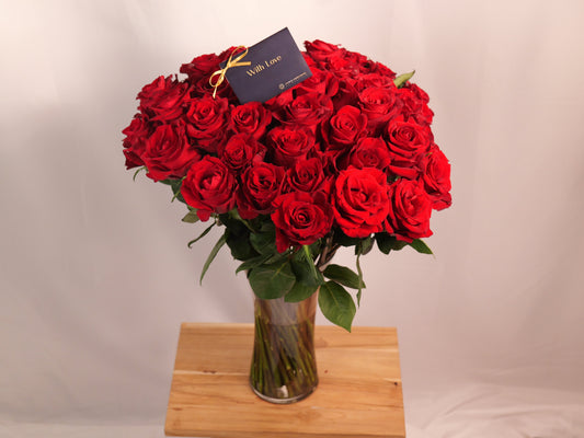 50 Red Roses in Large Glass Vase
